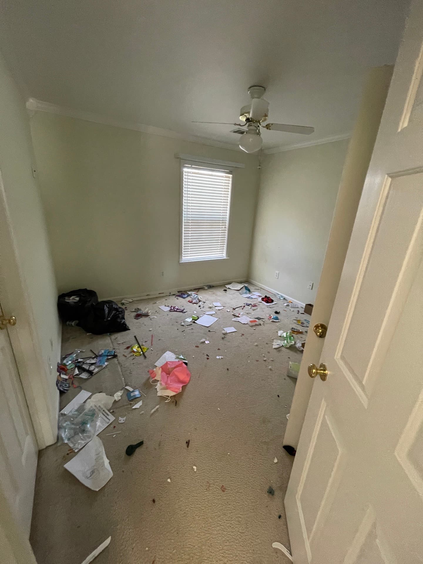 Bedroom debris removal transformation in Woodstock before cleaning